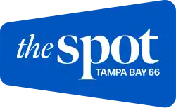 The words "the" in an italic thin serif and "spot" in a bolder serif, with "TAMPA BAY 66" in smaller sans serif print in the lower right corner, in an angled rounded rectangle