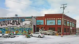 Building 2 (factory) with addition in the foreground, and office (right)