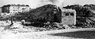 Ruins of the concentration camp, with remnants of what was a bunker seen in the foreground