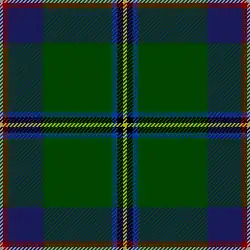 A green square cut into equal quarters by yellow, black, and blue "stitched" lines. Red and white stitches outline the entire square, and patches of blue and green fill the inner quadrants.