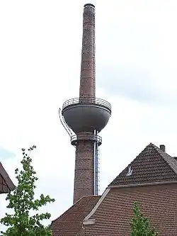 A chimney with water tank in Lengerich, Germany. Most chimneys with water tanks look similar.[citation needed]