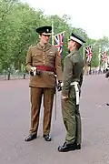 Coldstream Guards officer in No. 2 dress; guardsman wears a form of No. 13 dress