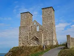 Looking up at Reculver towers from close by on a sunny day