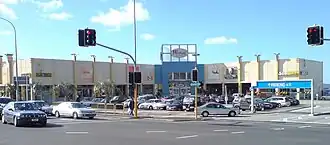 The front top parking lot at Glenfield Mall. Most of the parking, and most of the mall itself, is behind and below on further levels. (Photo taken prior to overhaul in the mid-2010s)