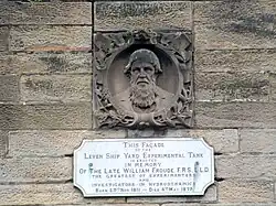 William Froude memorial on facade of building
