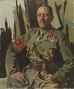 Portrait of Sir Henry Edward Burstall, three-quarter-length, slightly turned to the left, seated with his hand on his leg and holding his hat with the other, dressed in military uniform with an armband, a Sam Browne about his waist and across his chest, a ribbon bar pinned to his breast, a photomechanical print after William Orpen, early 20th century