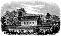A drawing of a brick, gable roof church with a graveyard to the right and surrounding fencing and trees.