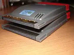 A pair of PC card devices, showing the connector