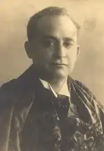 Sepia-toned portrait of Oliveira Viana looking toward the camera