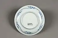 Upturned Japanese bowl with a decorated under-cavetto.