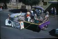 Rag Harris' float with swimming pool, date unknown