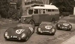 The three works Lotus XI entries, in from of the team's race transporter.